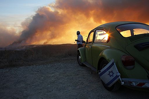 02.12.2010 На севере  Израиля в предместье Хайфы разбушевался крупный лесной пожар, жертвами которого стали уже более 40 человек. Власти страны обратились к соседним государствам с просьбой оказать помощь в борьбе с огнем