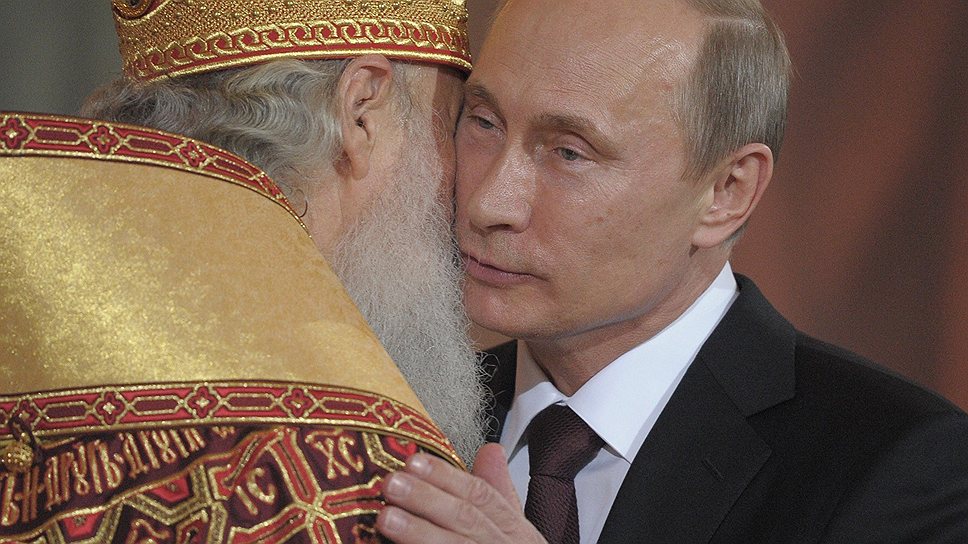 Патриарх Кирилл (слева), президент России Владимир Путин
