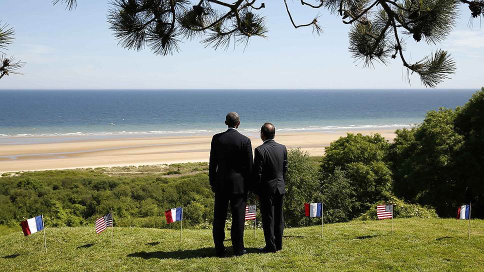 Президенты США и Франции Барак Обама и Франсуа Холланд у побережья Нормандии во время празднований семидесятилетней годовщины высадки союзных войск