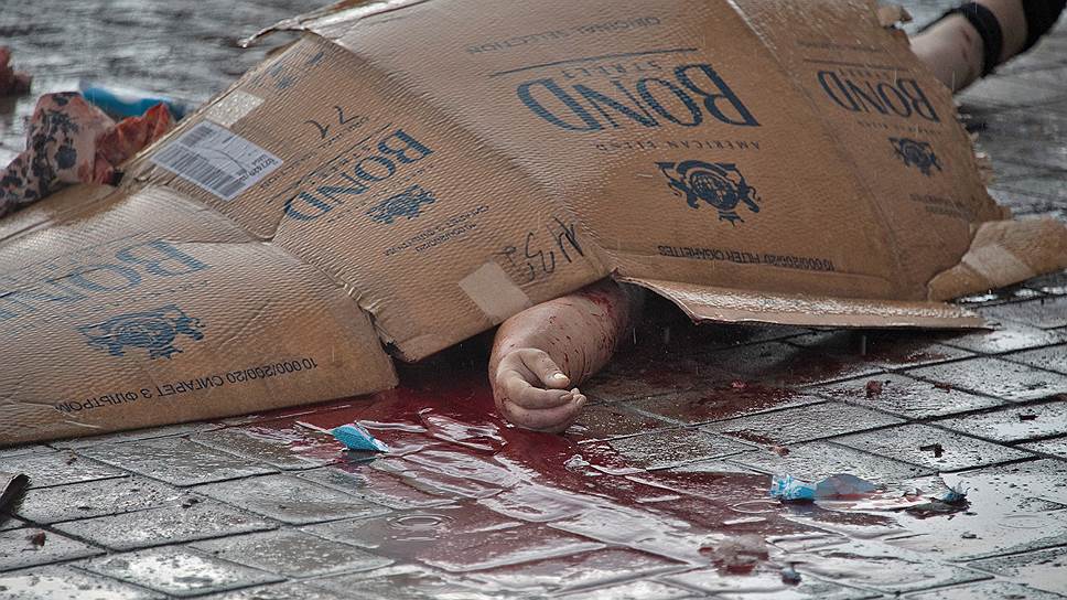 May, 26&lt;br>A woman killed by shrapnel lying on the square outside the railway station in Donetsk