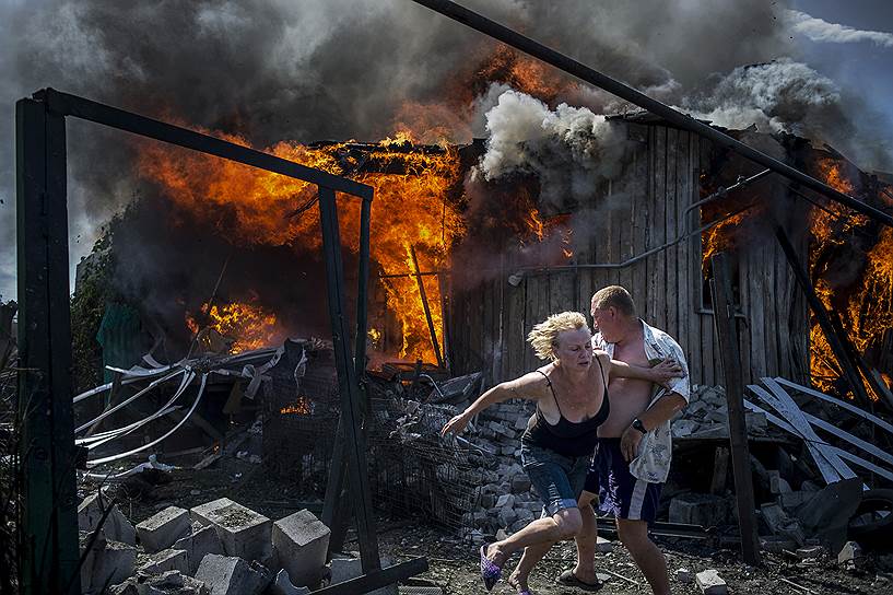 «Черные дни Украины». Серия фото была сделана в июле и июле недалеко от Луганска. Автор — фотокорреспондент «России сегодня» Валерий Мельников (Россия)