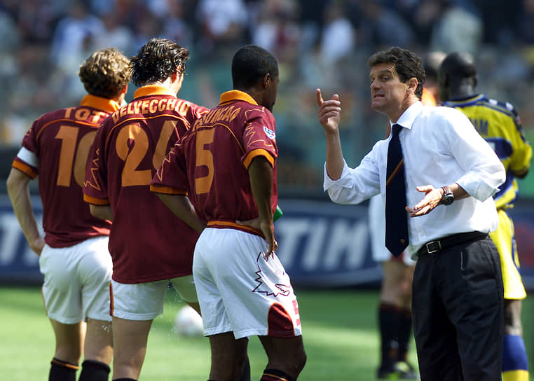 С 1999 года Фабио Капелло пять лет находился во главе тренерского штаба столичной «Ромы». Под его руководством команда стала чемпионом Италии и обладателем суперкубка страны