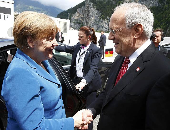 Канцлер ФРГ Ангела Меркель и президент Швейцарии Йоханн Шнайдер-Амманн