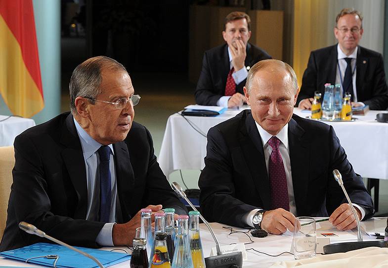 Министр иностранных дел России Сергей Лавров и президент России Владимир Путин