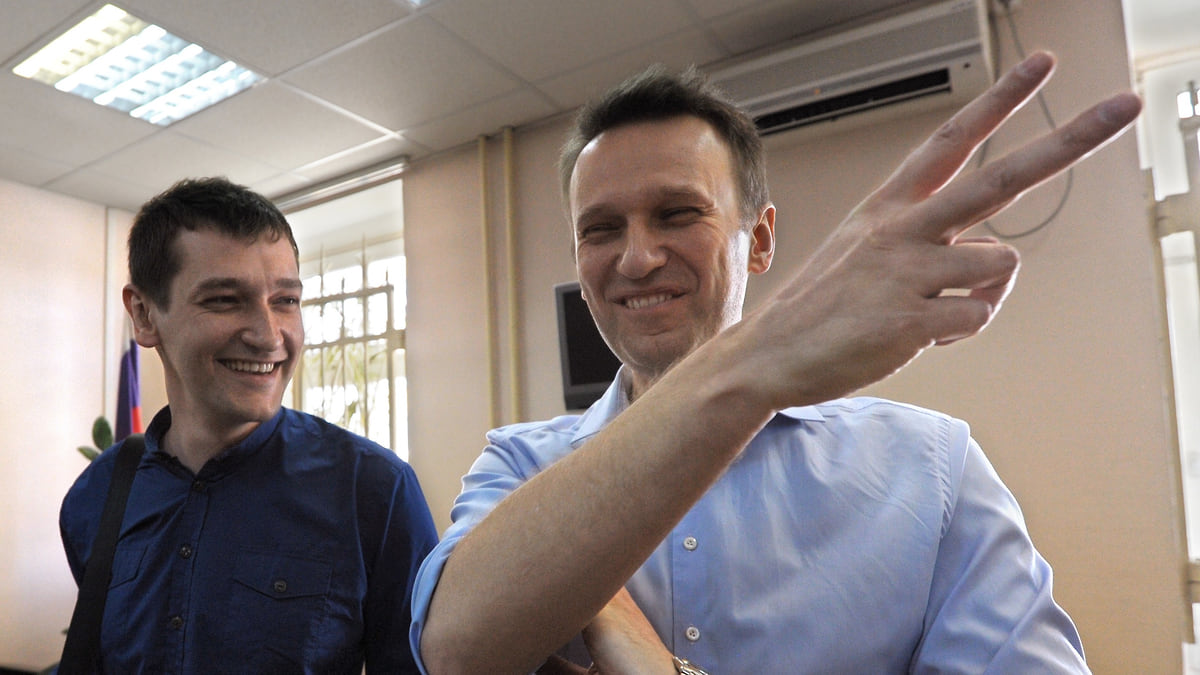 Алексей Навальный и его брат Олег (слева)