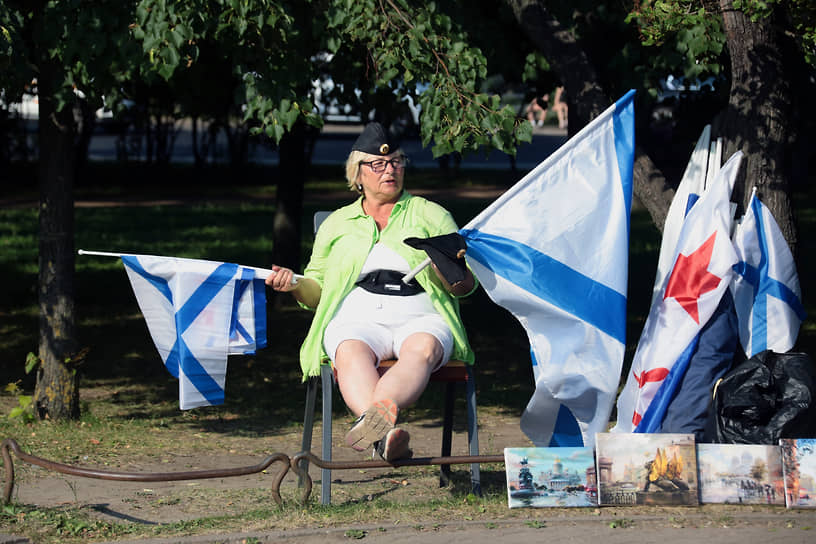 Продавец флагов