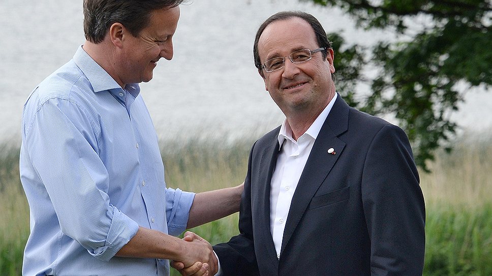 Премьер-министр Великобритании Дэвид Кэмерон (слева) и президент Франции Франсуа Олланд (справа)