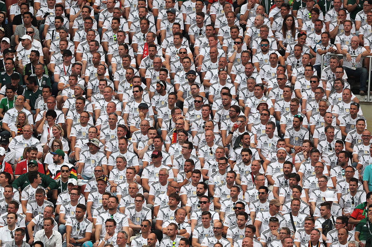 Чемпионат мира по футболу в России FIFA-2018. Групповой этап. Матч между сборными командами Германии и Мексики на стадионе &quot;Лужники&quot;. Болельщики сборной Германии на трибуне стадиона.