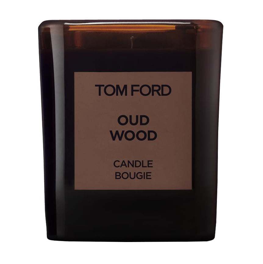 Tom Ford, ароматическая свеча Private Blend Oud Wood. Ноты: удовое дерево, кардамон, сандал, ветивер, бобы тонка и янтарь. Время горения – 40 часов.