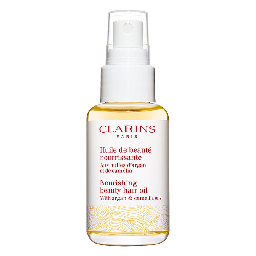 Clarins, питательное масло для волос Huile de Beaute Nourrissante. В составе: органические масла арганы и камелии