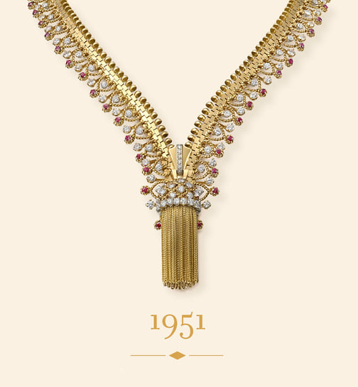 Колье Zip, 1951 год. Колье можно трансформировать в браслет. Желтое золото, розовое золото, платина, рубины, бриллианты