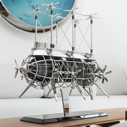 Номинация «Настольные часы»: L&#39;Epee Albatross X MB&amp;F, скелетированный механизм с функцией боя, автоматоном (16 пропеллеров), ручным заводом и запасом хода 8 суток (без учета автоматона); корпус 350 Х 600 мм – сталь; цена – 129 тыс., лимитированная 8 экз. серия
