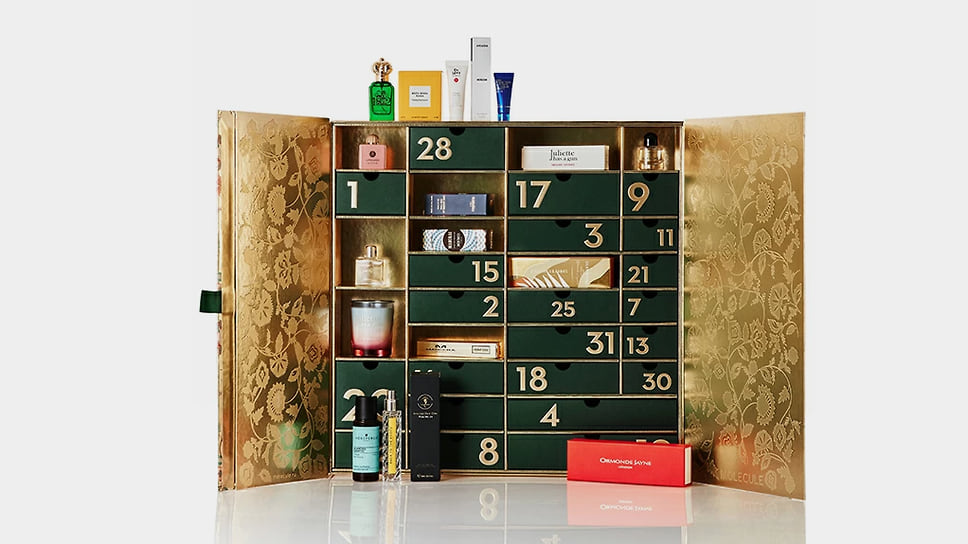 Molecule, лимитированный адвент-календарь с 31 ячейкой, в которых спрятаны ароматы, средства ухода за кожей и свечи от Vilhelm Parfumerie, Amouage, Clive Christian, Byredo, Stefano Ricci, Memo, Dr. Levy, Emma Hardie, Swiss Perfection, MZ Skin, Juliette Has a Gun