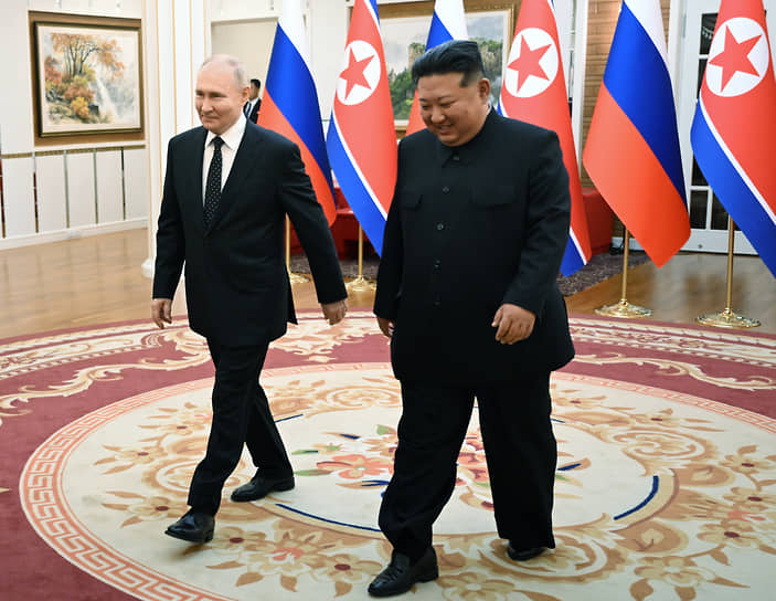 Владимир Путин (слева) и Ким Чен Ын