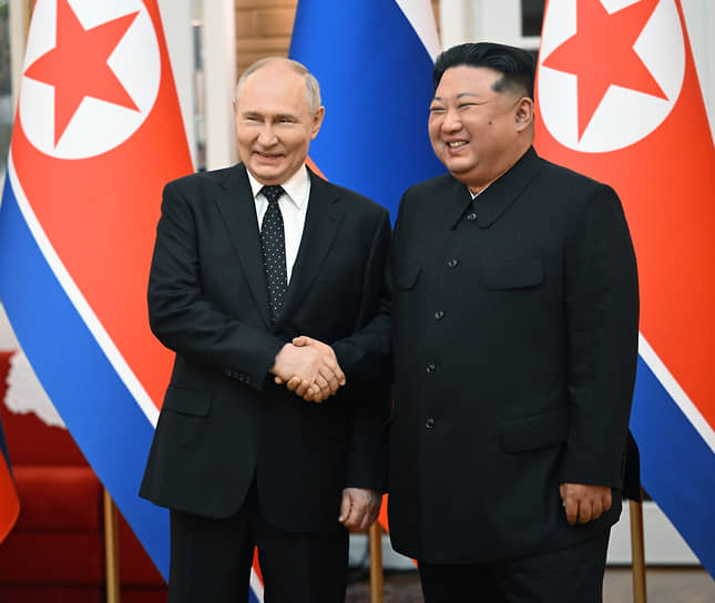 Владимир Путин (слева) и Ким Чен Ын