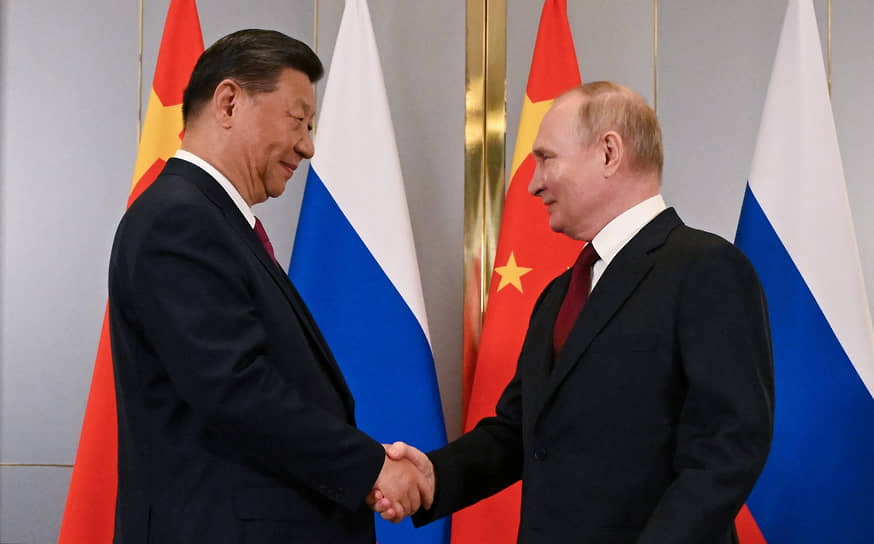 Си Цзиньпин (слева) и Владимир Путин