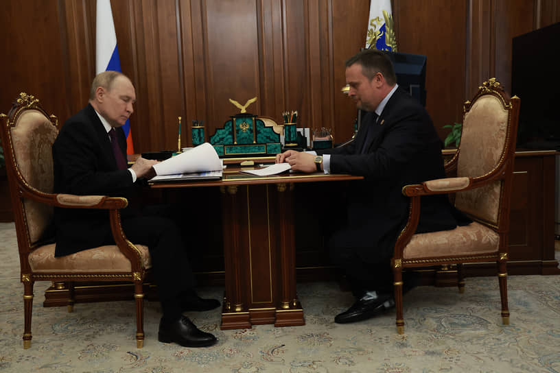 Владимир Путин (слева) и Андрей Никитин во время встречи