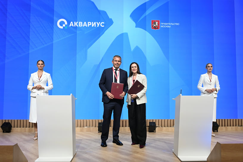 Председатель совета директоров группы компаний «Аквариус» Алексей Калинин и заместитель мэра Москвы, руководитель департамента экономической политики и развития города Мария Багреева