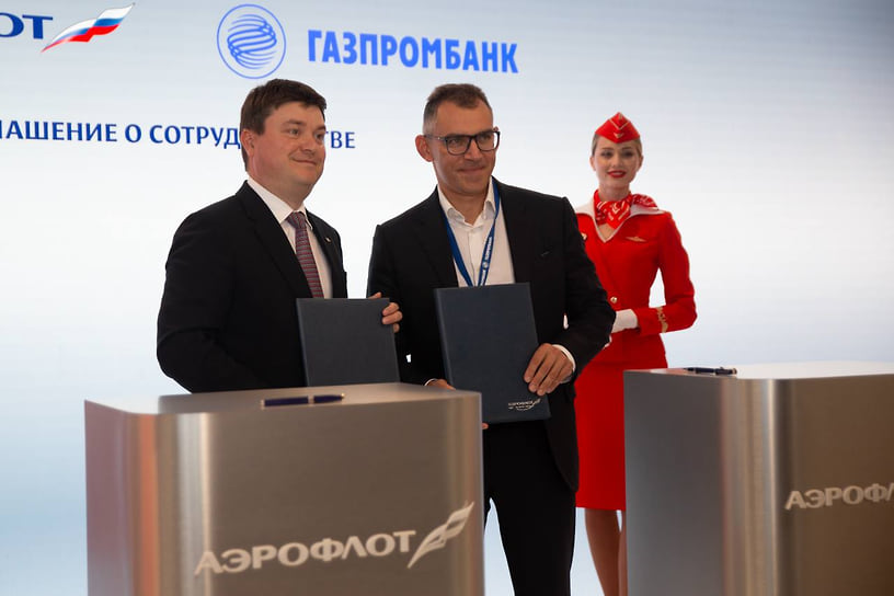 Первый заместитель генерального директора Аэрофлота по коммерции и финансам Андрей Чиханчин и заместитель председателя правления АО «Газпромбанк» Дмитрий Зауэрс