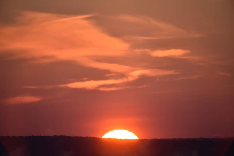 Заход солнца за горизонт в Новосибирской области