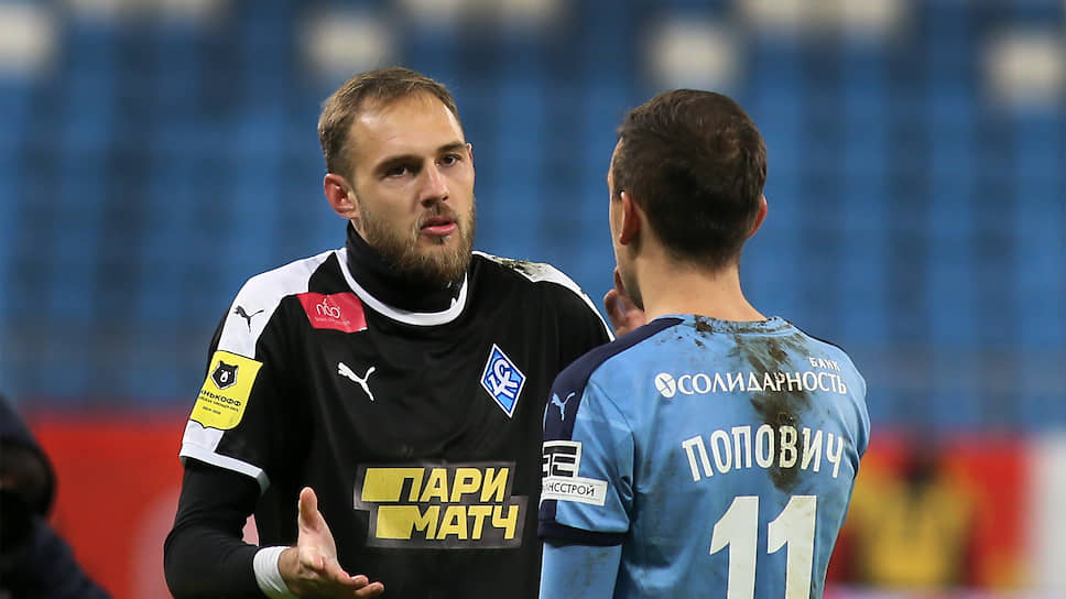 Евгений Фролов и Денис Попович на поле