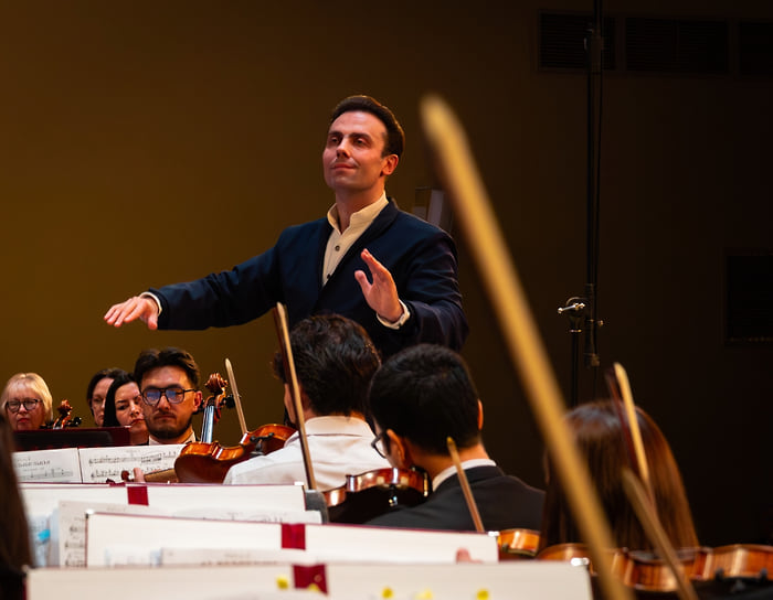 Именно с того года главным дирижером оркестра является Дмитрий Крюков